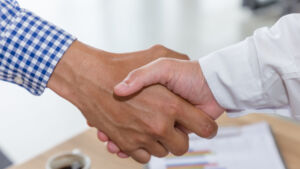 Business people shake hand in meeting