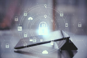 Close,Up,Of,Tablet,With,Abstract,Glowing,Padlock,Hologram,On